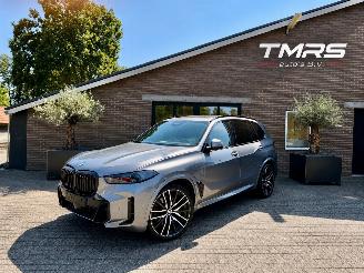 Damaged car BMW X5 BMW X5 50e xDrive M Sport PANORAMADAK LUCHTVERING HUD TREKHAAK  AMBIANCE 2025/1