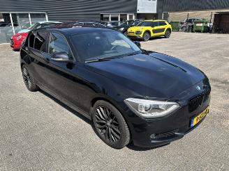 damaged passenger cars BMW 1-serie 116i  5-drs  High Exe. 2013/12