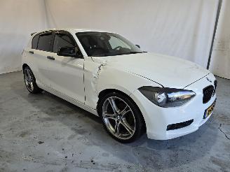 skadebil auto BMW 1-serie 114i EDE Business 2014/12