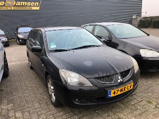 Vaurioauto  passenger cars Mitsubishi Lancer  2004/3