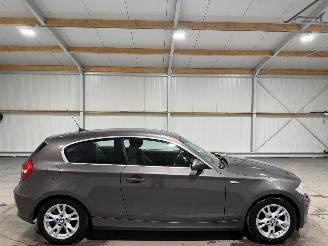 damaged passenger cars BMW 1-serie 118d 100kW Airco Corporate Business Line 2009/1
