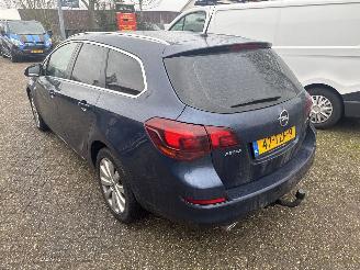 Vaurioauto  passenger cars Opel Astra SPORTS TOURER 1.4  TURBO CUSMO 2012/4