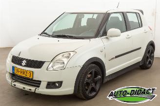 damaged passenger cars Suzuki Swift 1.3 Airco Camera Shogun 2009/2