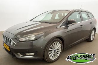 Damaged car Ford Focus 1.0 92 kw VERBRUIKT KOELVLOEISTOF Navi Clima Titanium Edition 2015/12