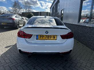 skadebil auto BMW 4-serie 420i High Executive 2017/8