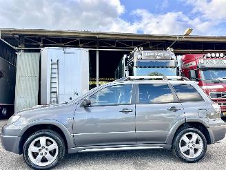 skadebil auto Mitsubishi Outlander 2.0 Turbo 201pk 4WD - uniek - 2x schuifdak - airco - leer + alcantara + stoelverw - privacy glass - rijdbaar 2005/3