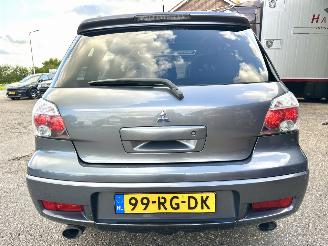 Mitsubishi Outlander 2.0 Turbo 201pk 4WD - uniek - 2x schuifdak - airco - leer + alcantara + stoelverw - privacy glass - rijdbaar picture 6