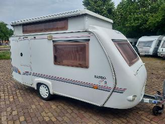 Vaurioauto  caravans Rapido  Club evolution 31 + Voortent 2002/8