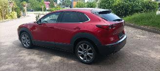 Mazda CX-30 1.8-Skyactive HeadUp Leder Sportstoelen Full-Led koplampen Led achterlichten Climatecontrol CruiseControl Stoelverwarming Lichtautomaat Privacyglas keyless Entry Bose Soundsystem  elektrische achterklep Blindspot system picture 3