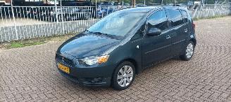 Tweedehands auto Mitsubishi Colt 1.3-16v Automaat 95pk Airco Lichtautomaat cruisecontrol Regensensor 4xElektrische ramen Elektrische-spiegels met verwarming Centrale vergrendeling met afstandsbediening Privacyglas leren stuurwiel mistlampen Metallic Lak Trekhaak  volledig Onderhouden! 2011/9
