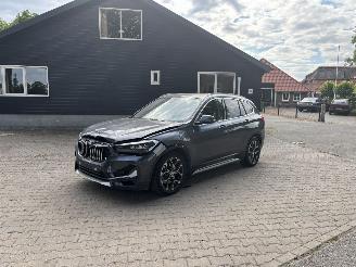 krockskadad bil auto BMW X1 PLUG IN HYBRIDE AUTOMAAT PANORAMADAK LEER NAVI CLIMA B.J 2020 2020/4