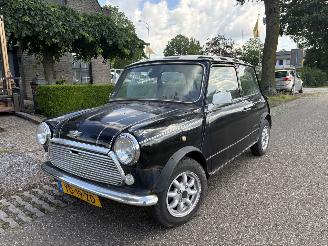 skadebil auto Mini 1000 U9 OPKNAPPER 1990/3